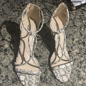 Gently worn heeled sandals